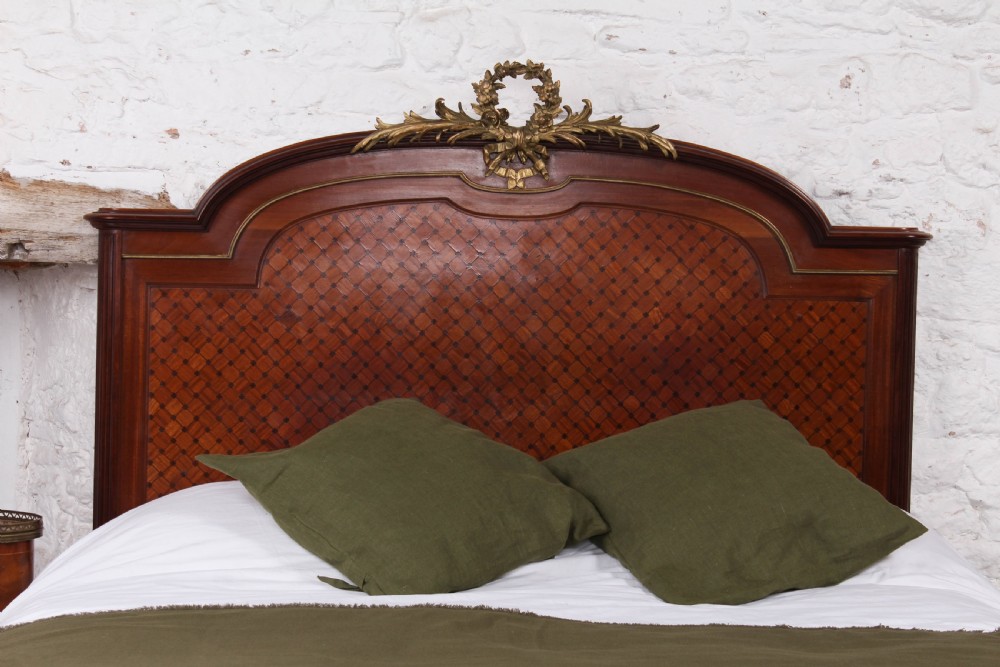 Handsome king size mahogany and fruitwood decorative bed View III