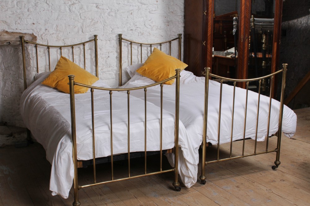 Very nice pair of Edwardian single all brass beds