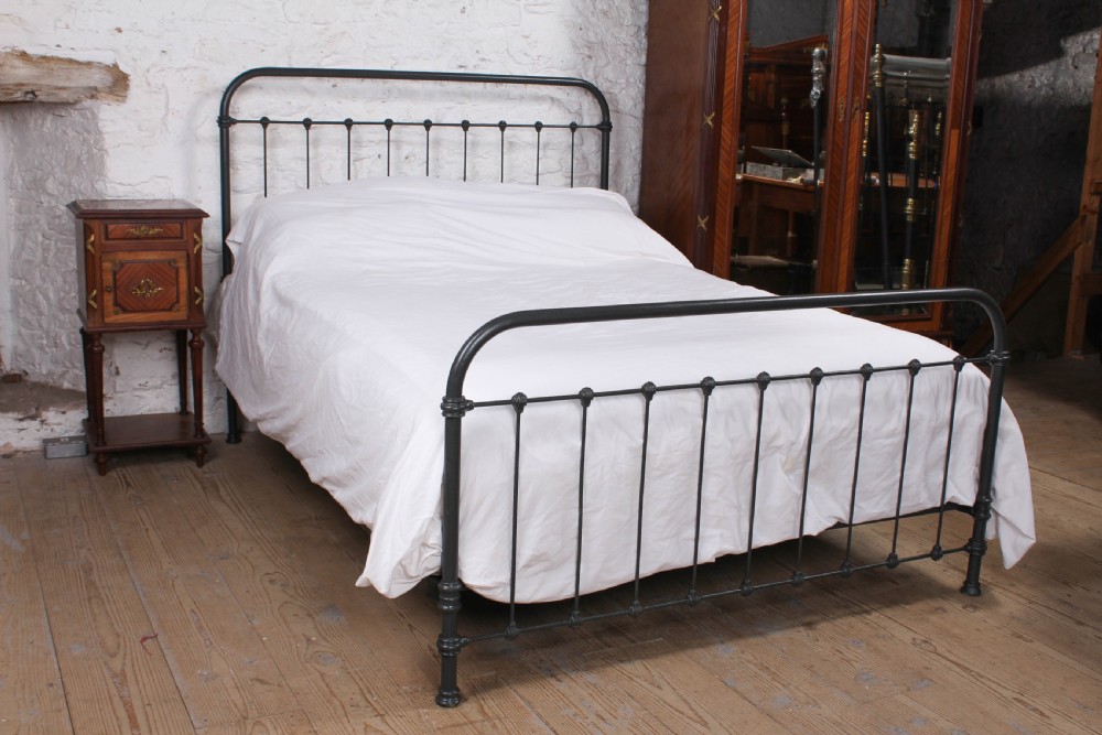 Pleasingly simple French all iron king size bed