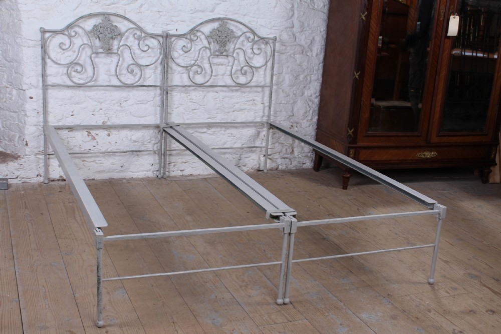 Pretty pair of small single forged iron beds (can be joined) View IV
