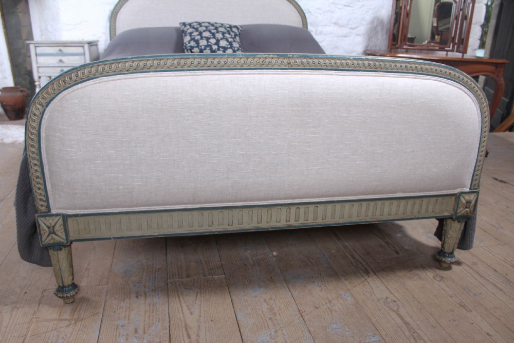 Attractive French upholstered king size bed with carved frame  View II