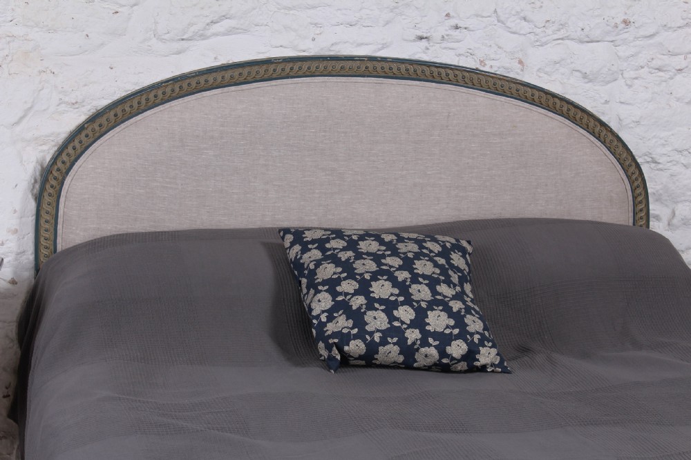Attractive French upholstered king size bed with carved frame  View III