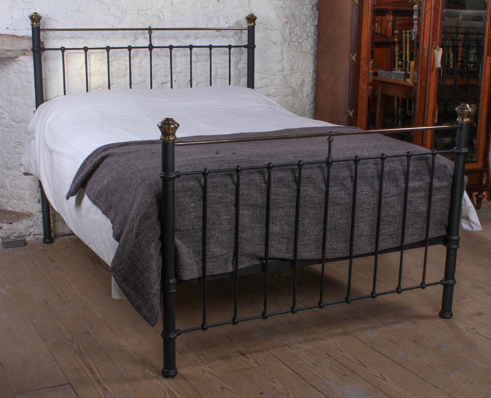 Sturdy classic Edwardian brass and black king size bed