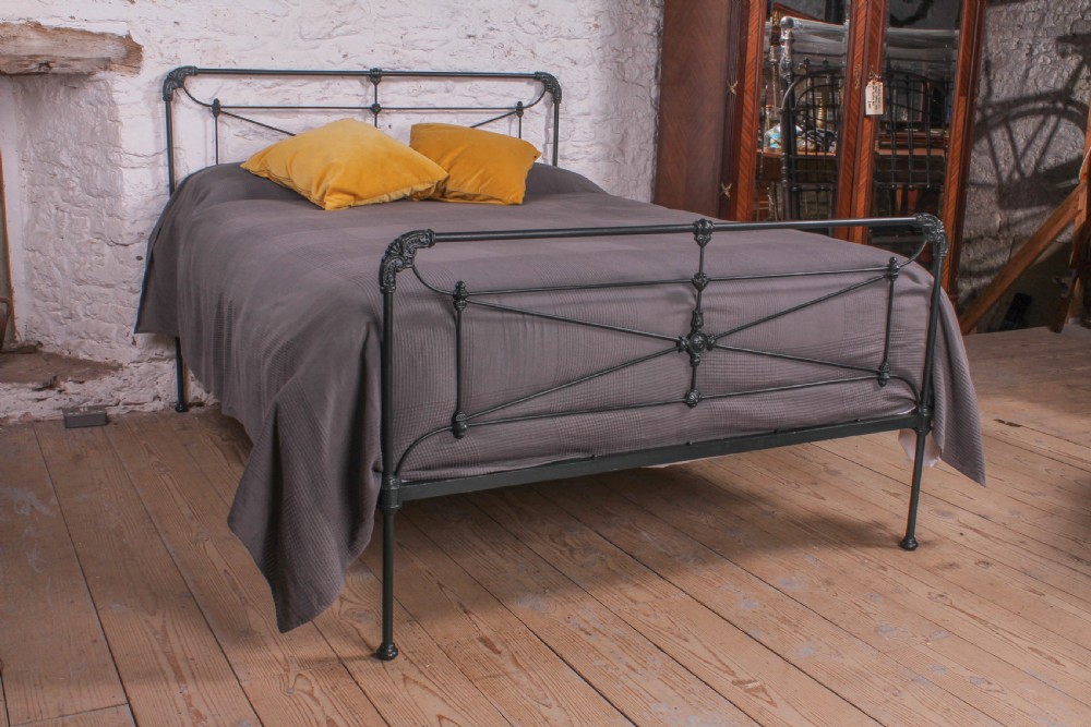 Pleasingly simple 5Ft  Spanish iron king size bed