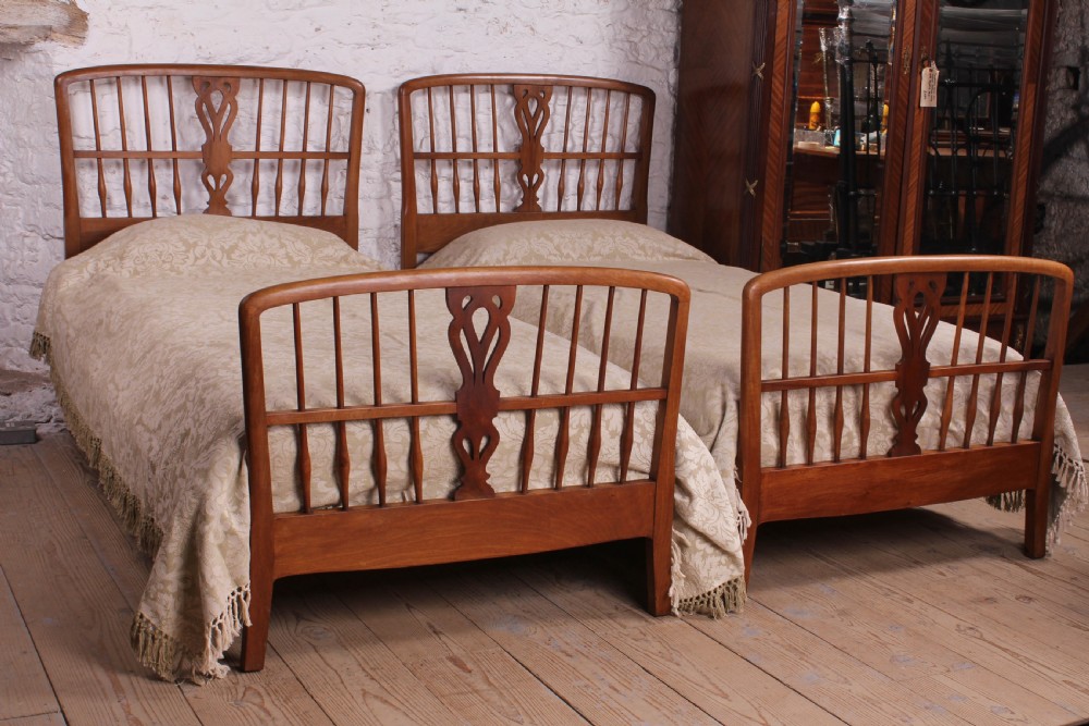 Nice pair of Heals oak single beds