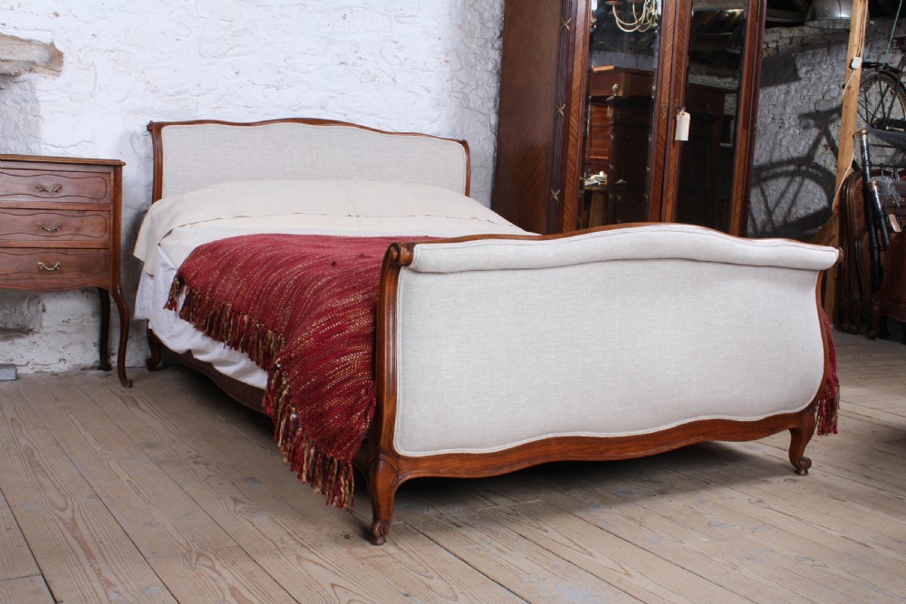 Newly upholstered French Lit Bateau style king size bed 
