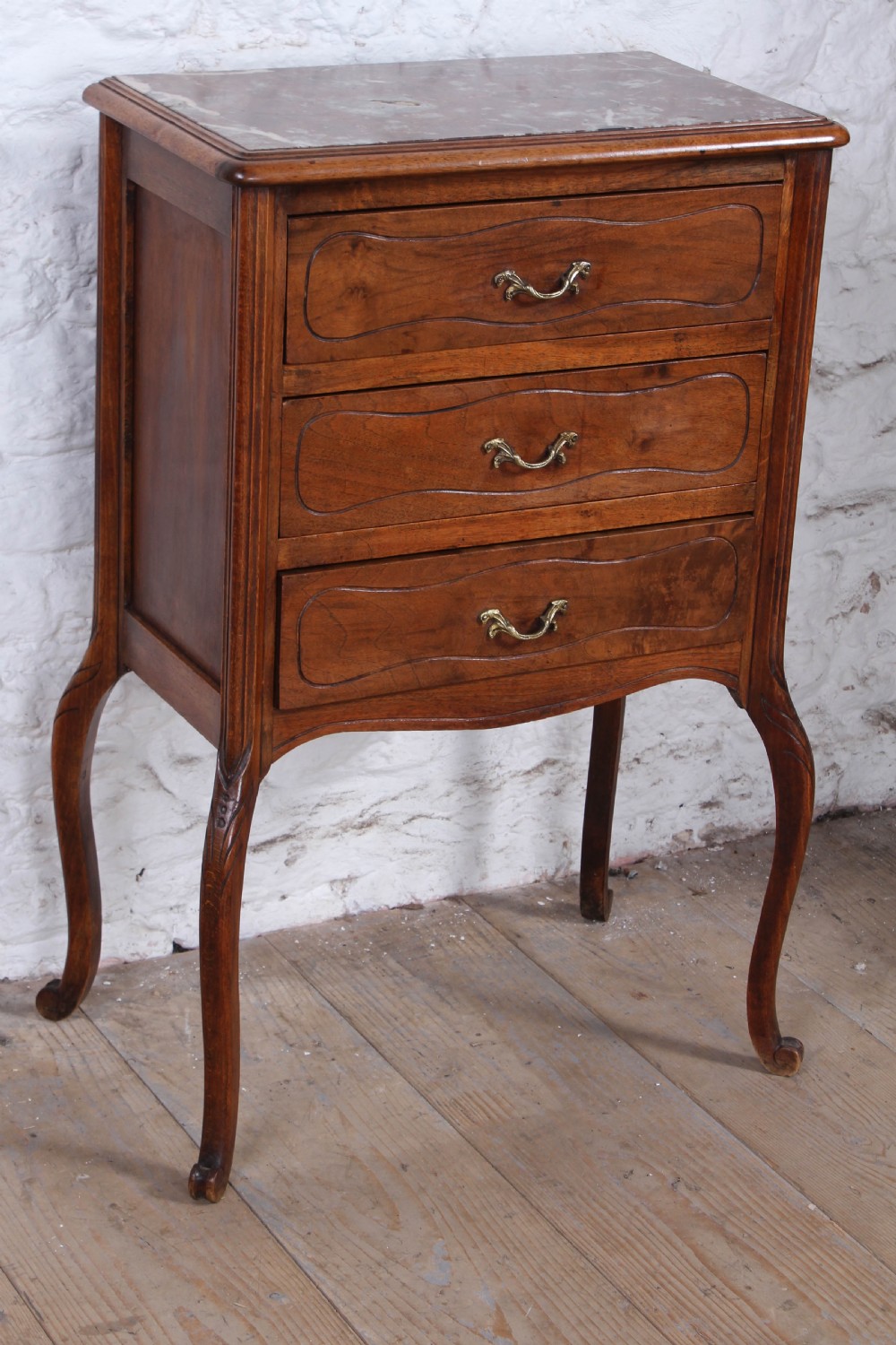 Attractive three drawer French walnut Bedside table 