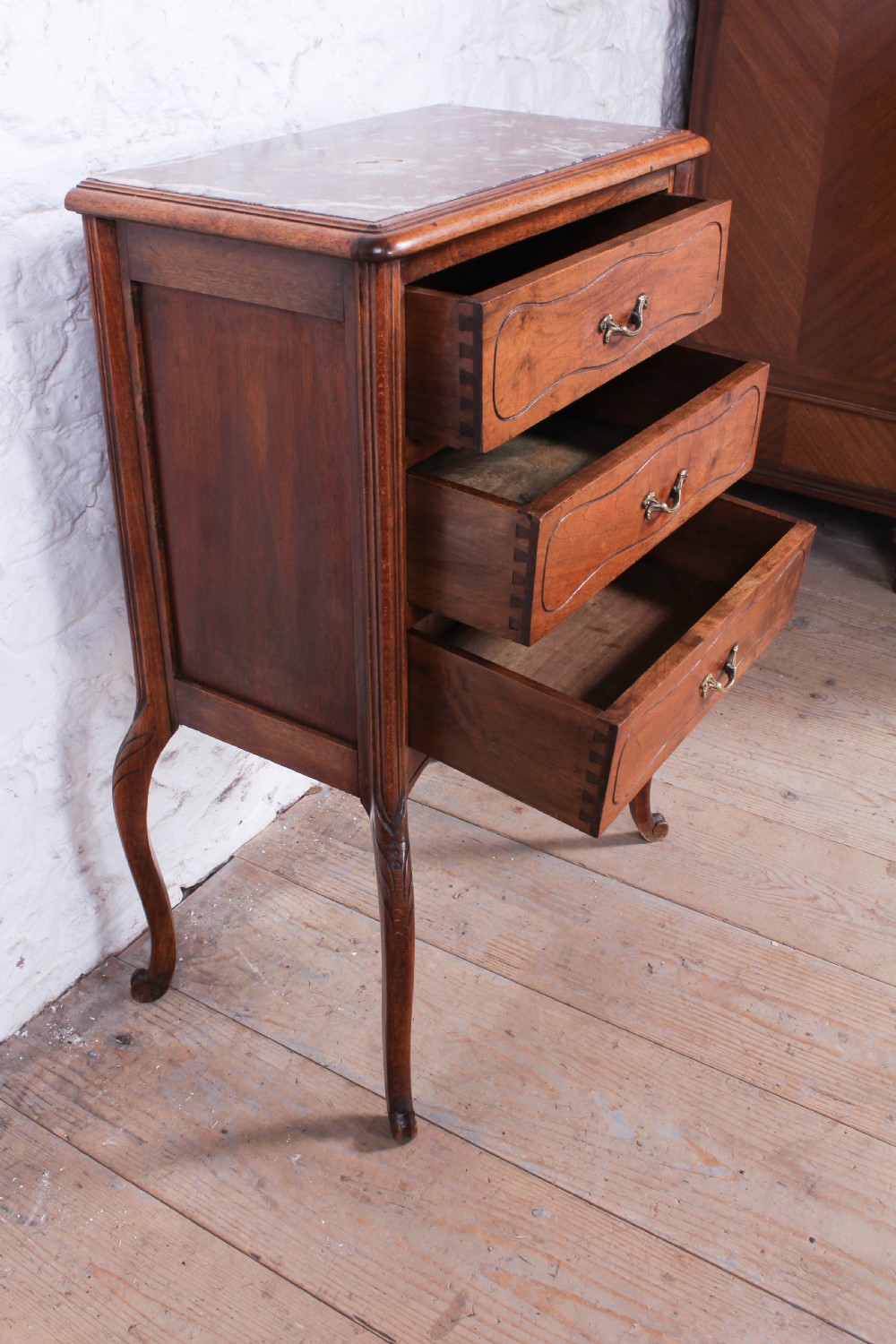 Attractive three drawer French walnut Bedside table  View III