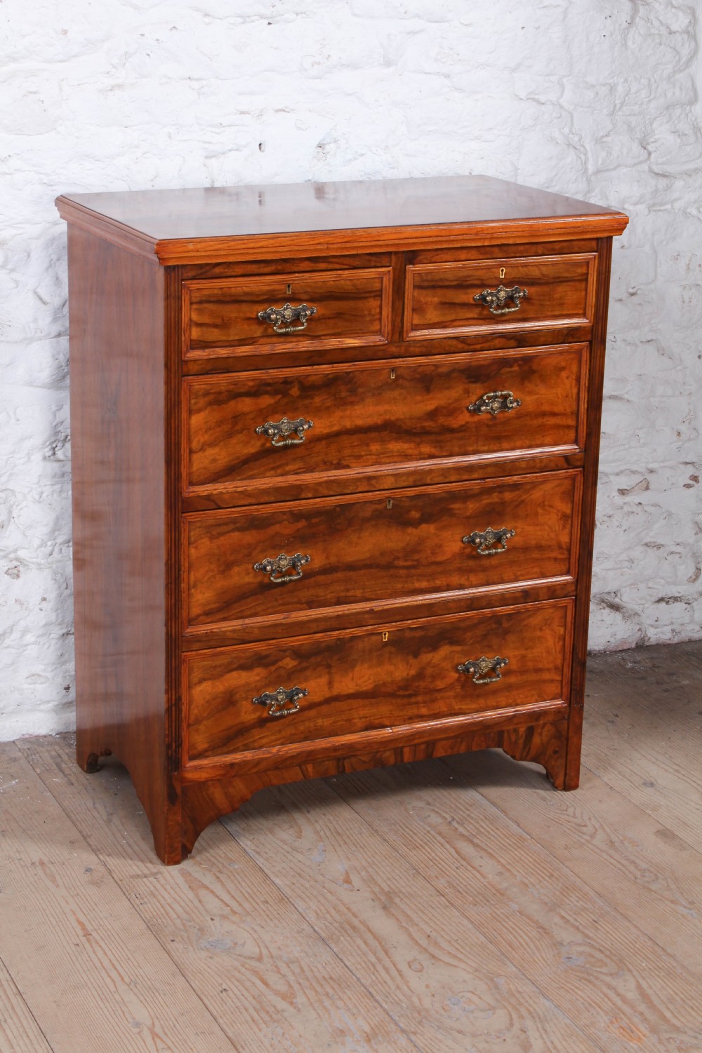 Rare  Olive wood small chest of drawers by Maples and Co