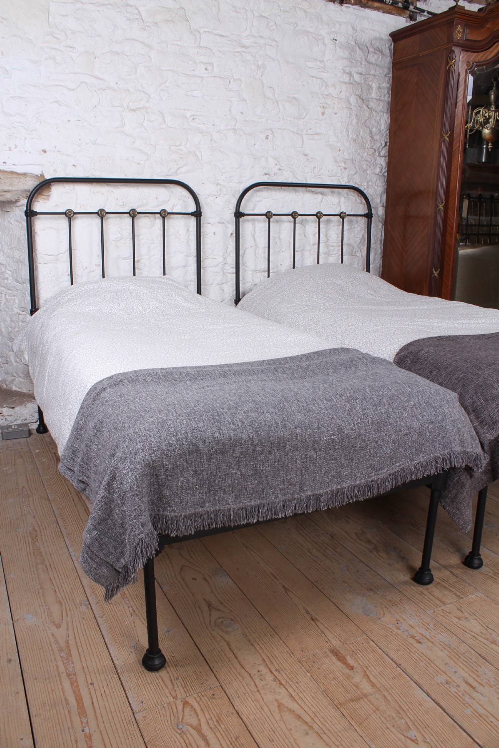 Lovely hand finished pair of iron and brass single beds View V