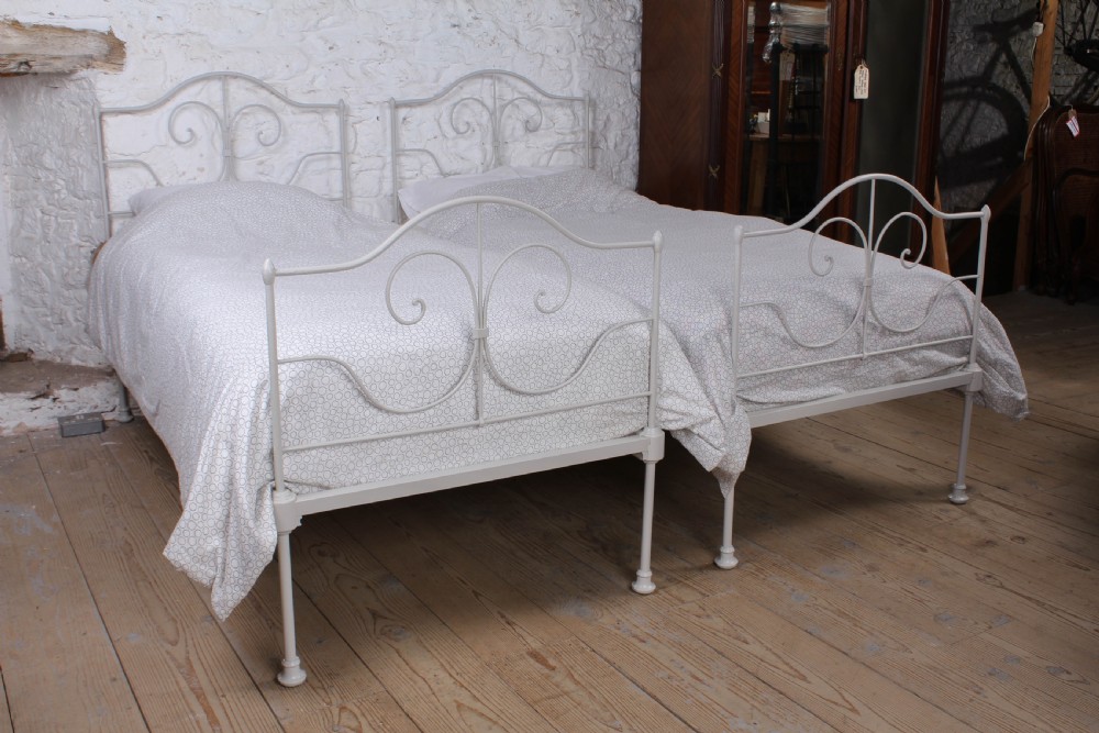 Pretty pair of simple forged iron single beds (can be joined)