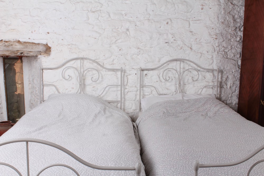 Pretty pair of simple forged iron single beds (can be joined) View V