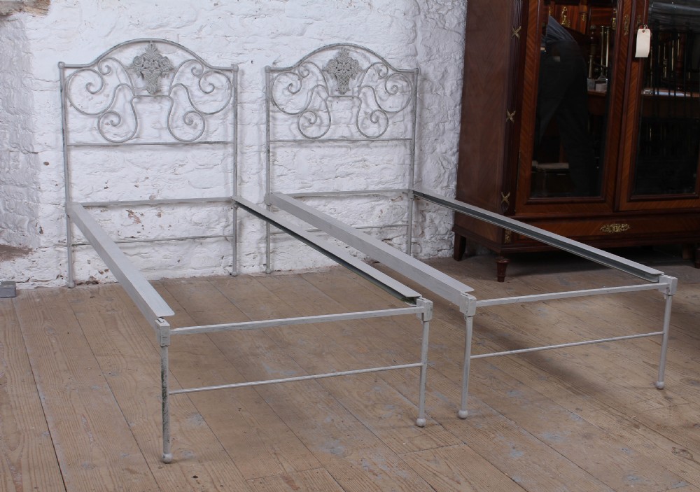 Pretty pair of forged iron small single beds (can be joined)