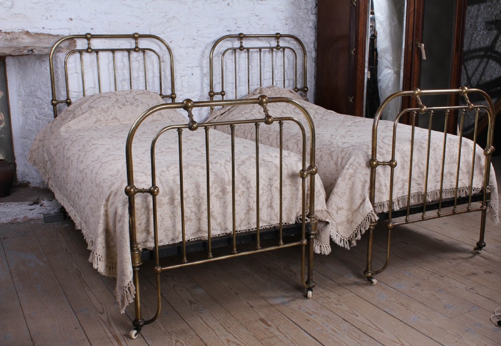 Interesting pair of all brass single beds