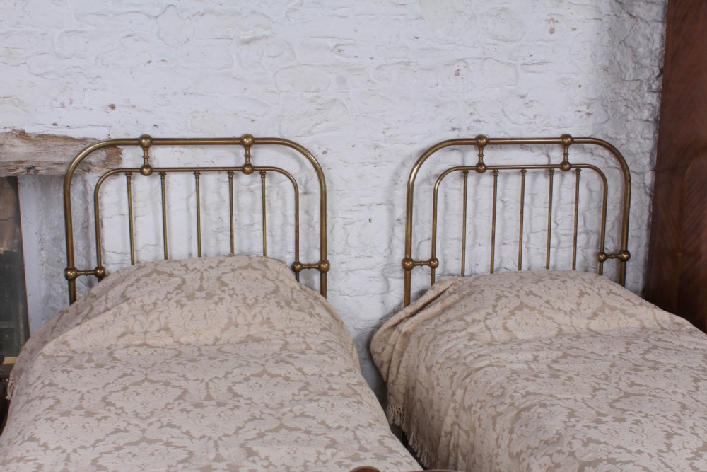 Interesting pair of all brass single beds View IX