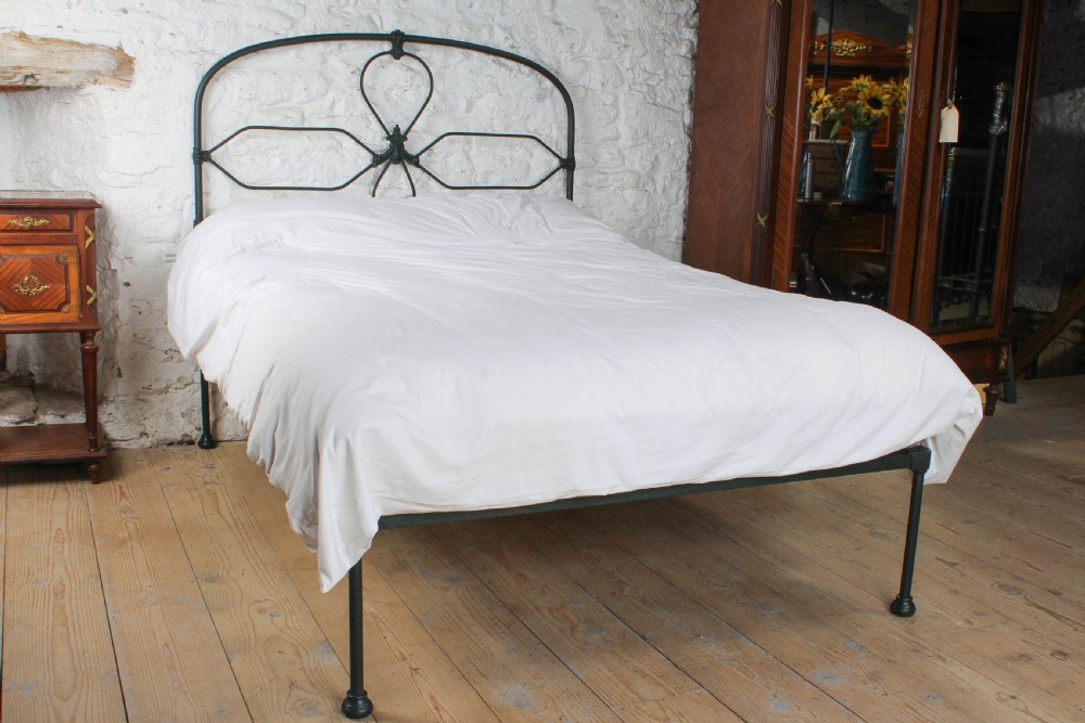 Pleasingly simple Irish all iron no end double bed