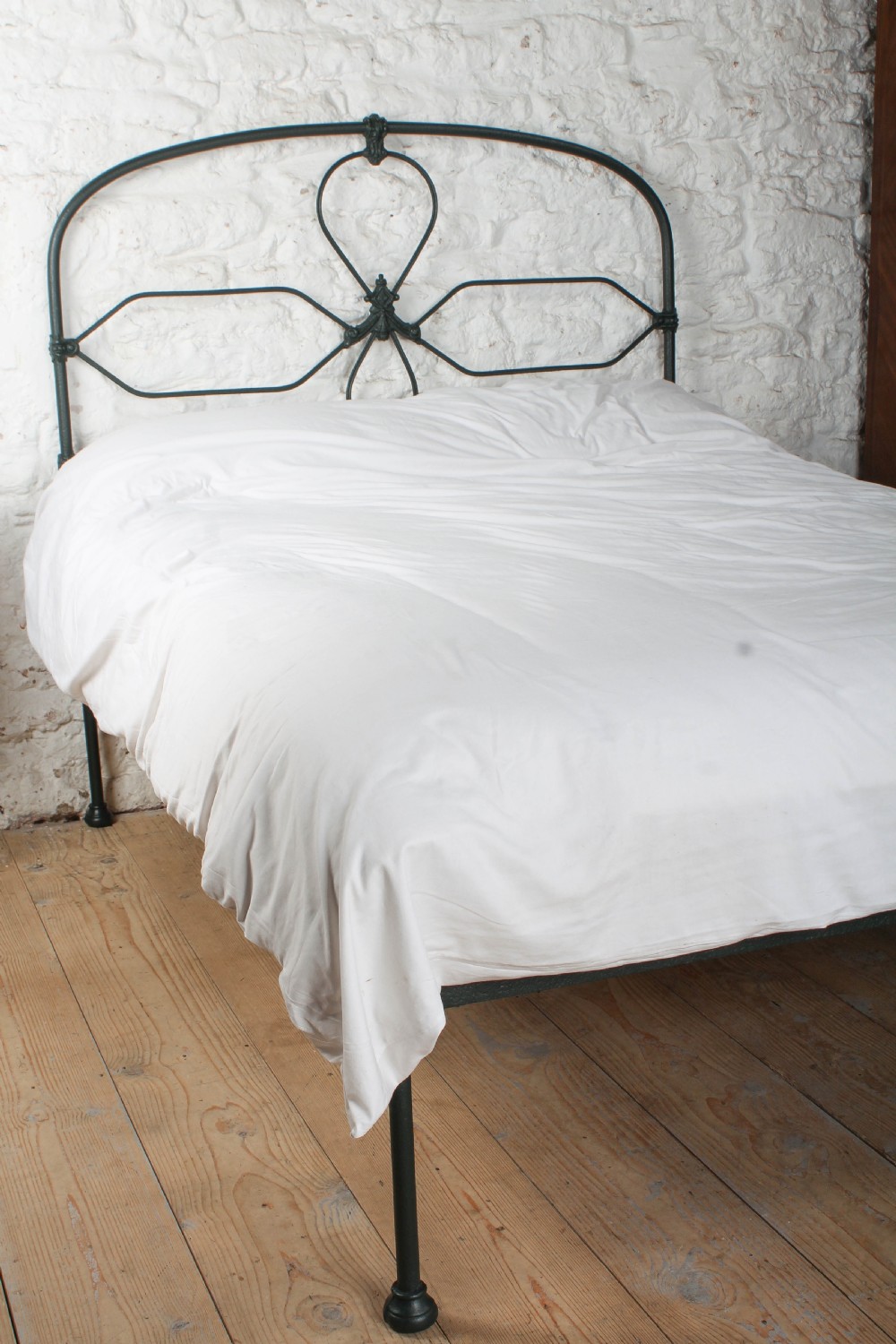 Pleasingly simple Irish all iron no end double bed View VII