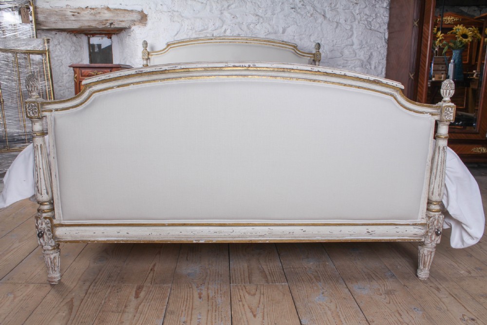 Aged gilded paint work newly upholstered French double bed  View II