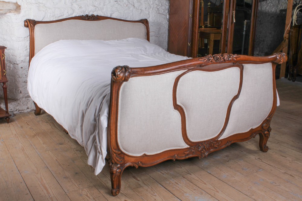 Handsome early upholstered Louis XV style king size bed