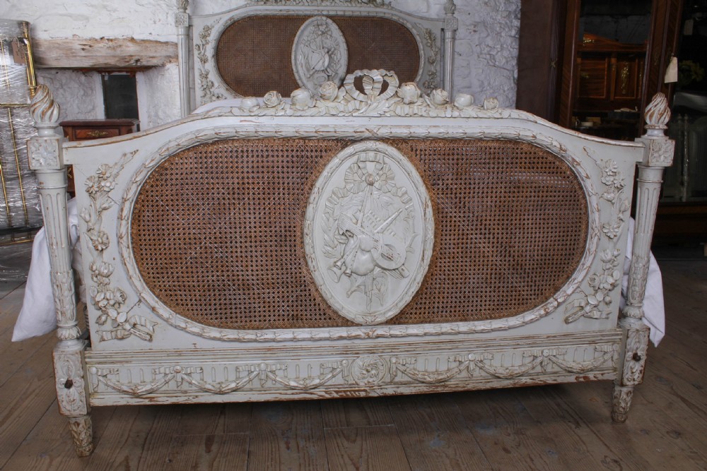 Spectacular French carved and caned European king size bed View II