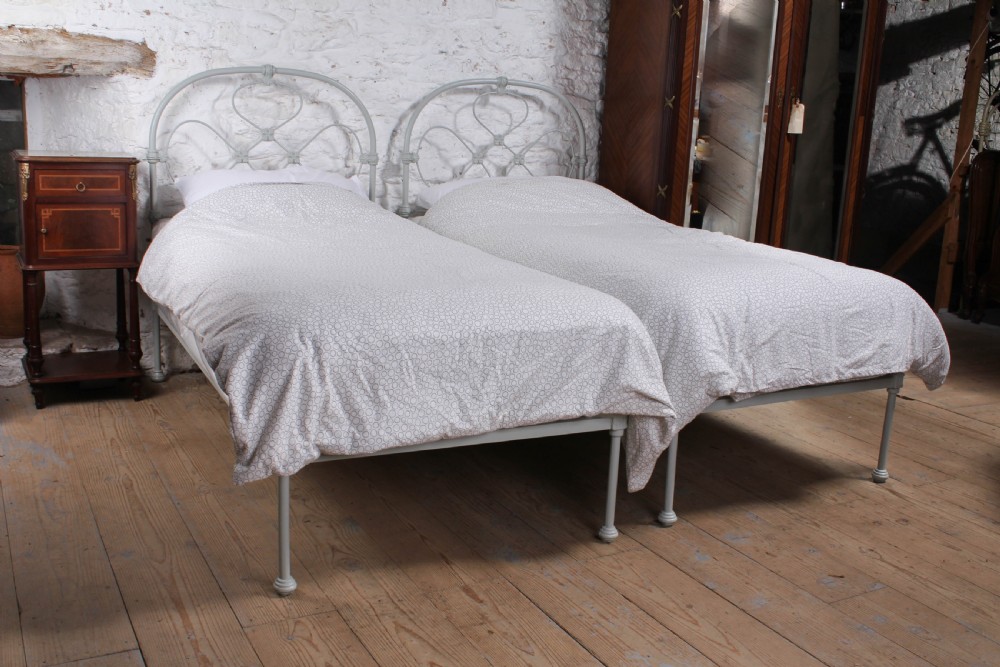 Attractive pair of single all iron no end beds (can be joined)