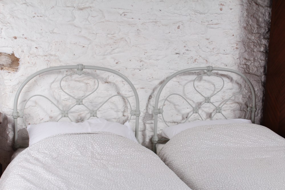 Attractive pair of single all iron no end beds (can be joined) View III