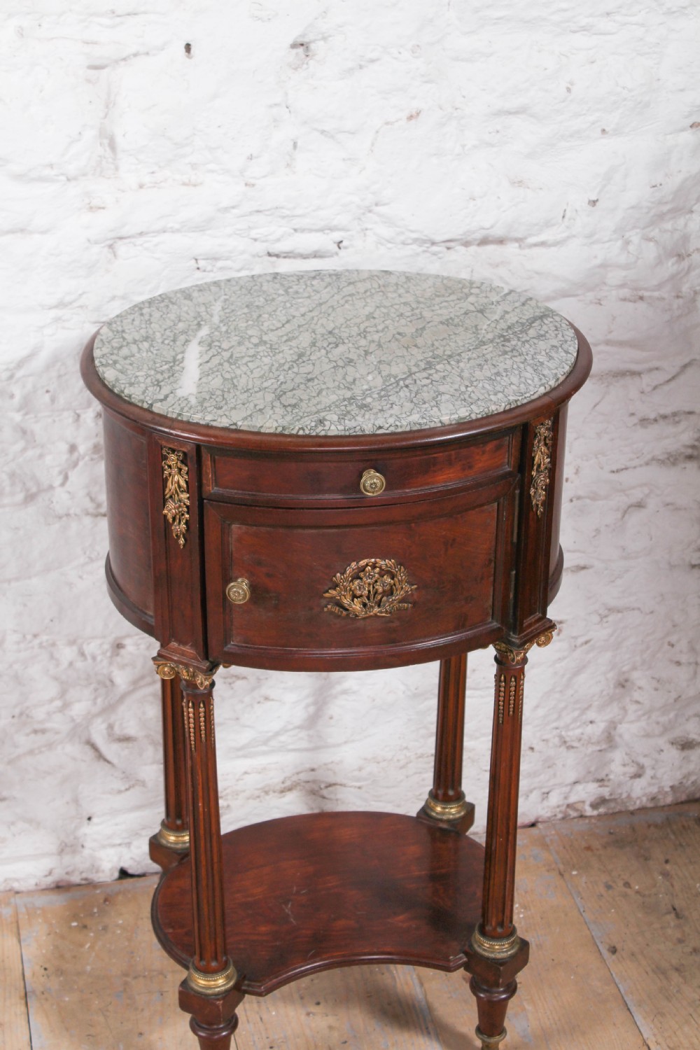 Beautiful quality oval mahogany bedside with marble top View III