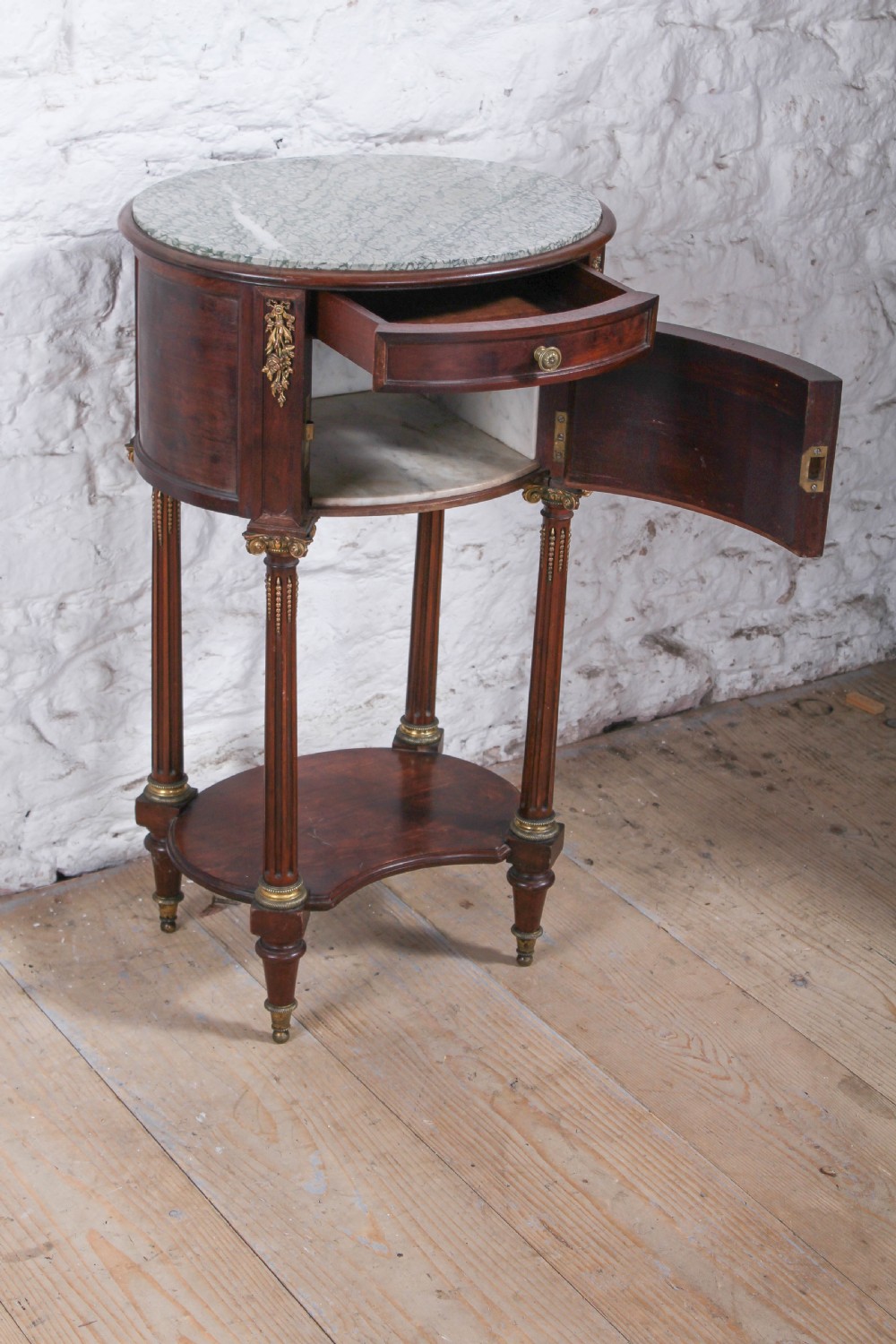 Beautiful quality oval mahogany bedside with marble top View IV