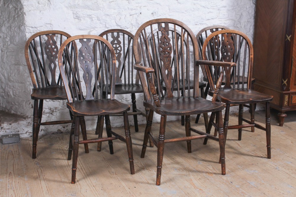 6 Windsor Wheel back chairs with carver 