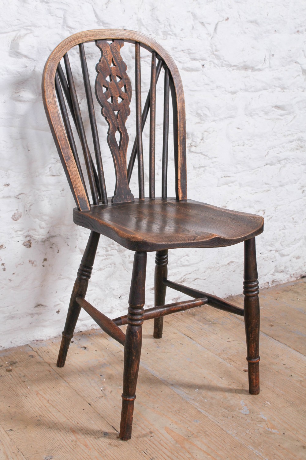 6 Windsor Wheel back chairs with carver  View IV