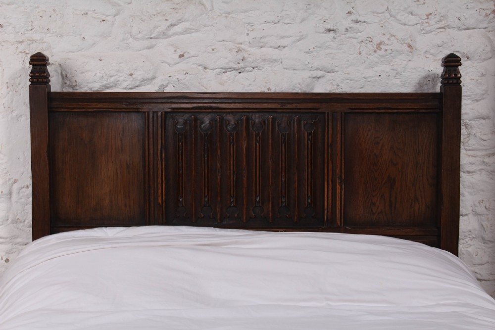 Lovely  oak double bed with linen fold detail  View II