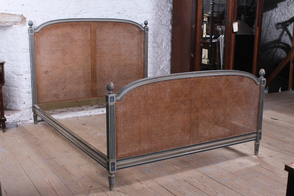 Attractive Caned king size bed with fluted posts  View IX