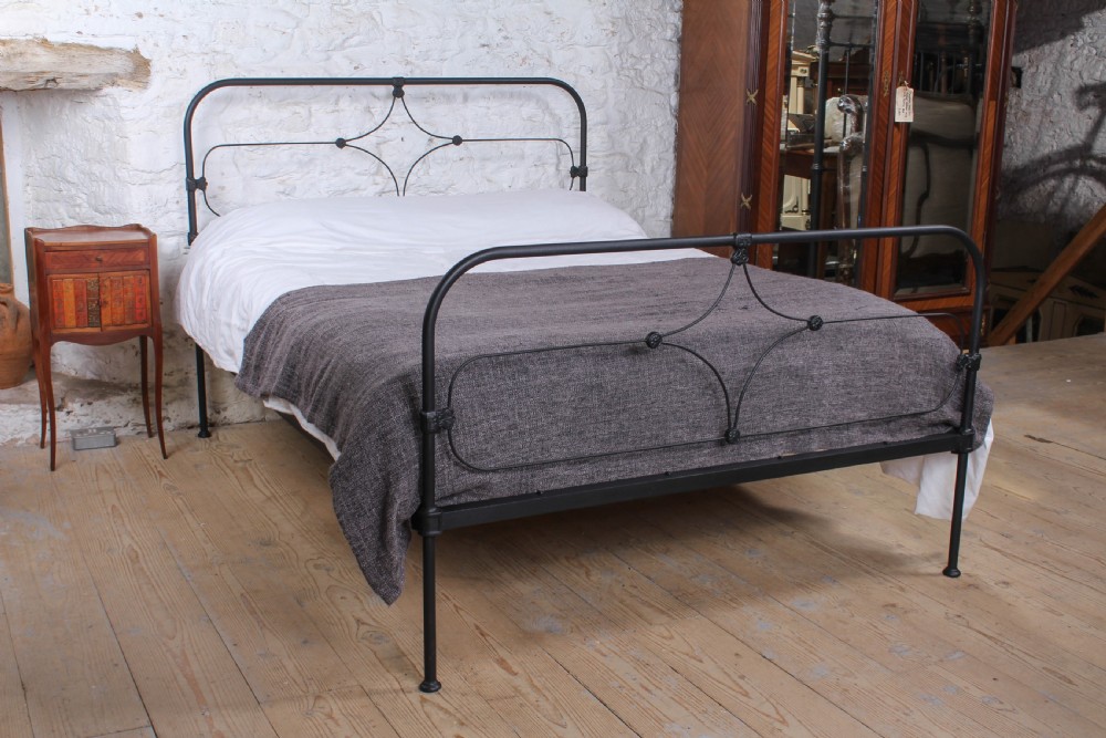 Pleasingly simple Irish all iron king size bed