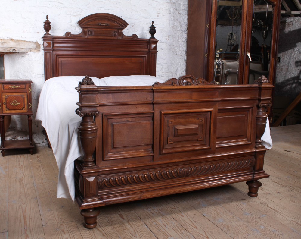 Very handsome French solid walnut king size bed