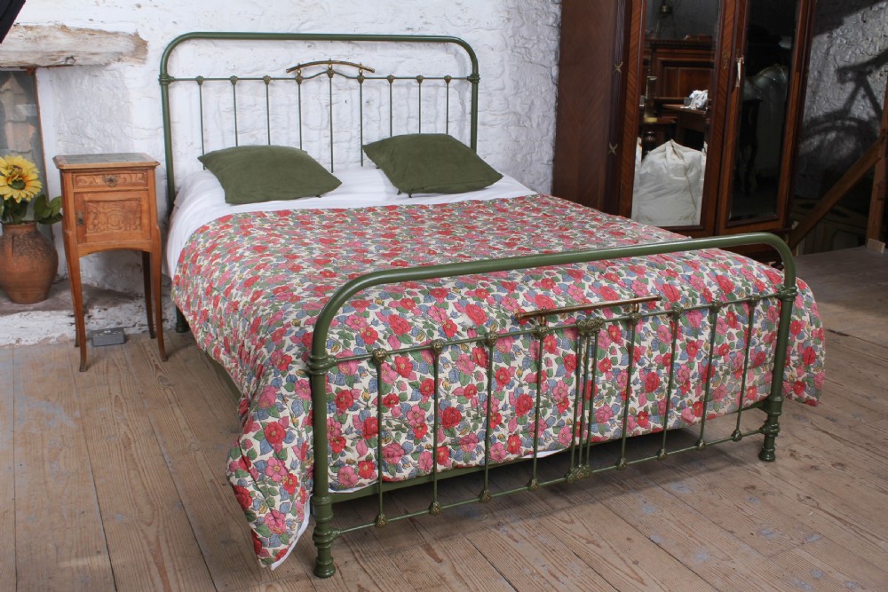 Pretty green iron and brass French king size bed