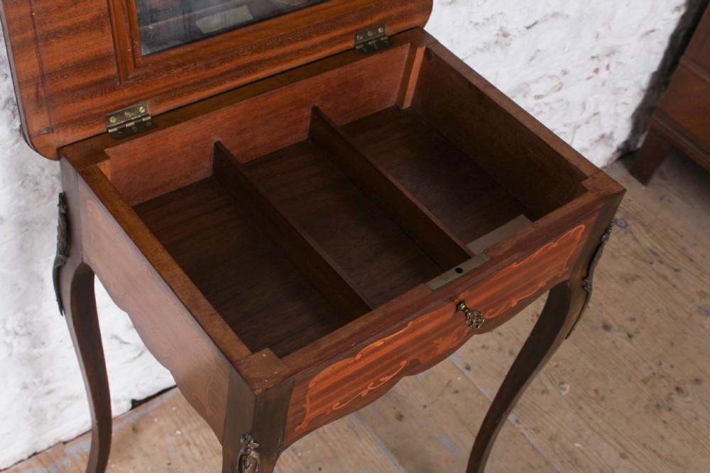 A French Louis XV style walnut side table featuring floral marquetry inlay, cabriole legs, and brass ormolu mounts. View VIII