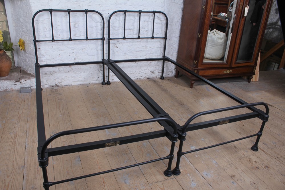 Lovely simple pair of Staples  utilitarian single iron beds (can be joined) View VIII