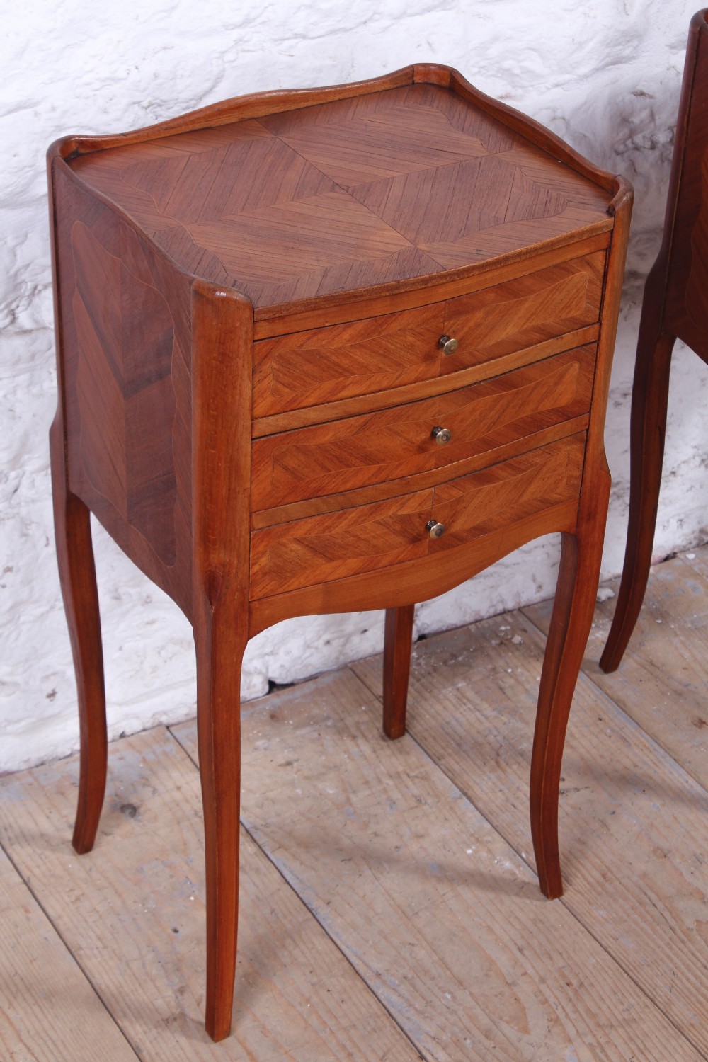 Pretty pair of walnut three drawer bedsides View II