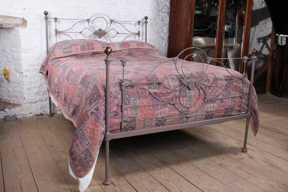 Pretty early Victorian iron king size bed