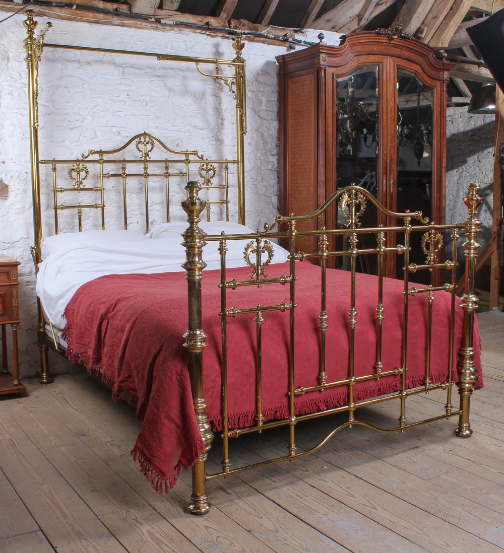 Spectacular Victorian original king size all brass half tester bed