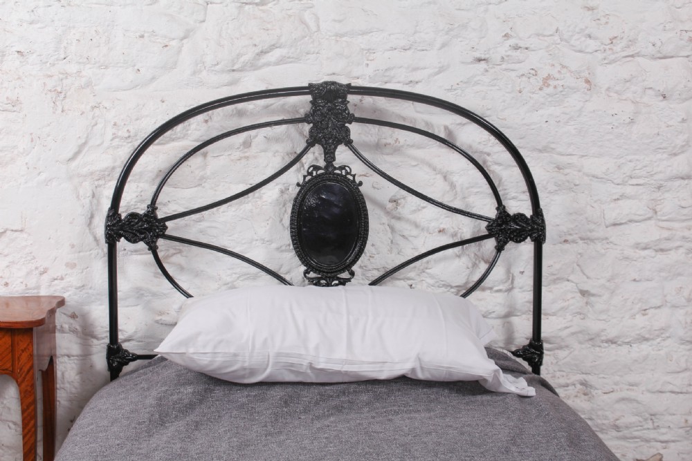 Handsome early Victorian black large single bed View II
