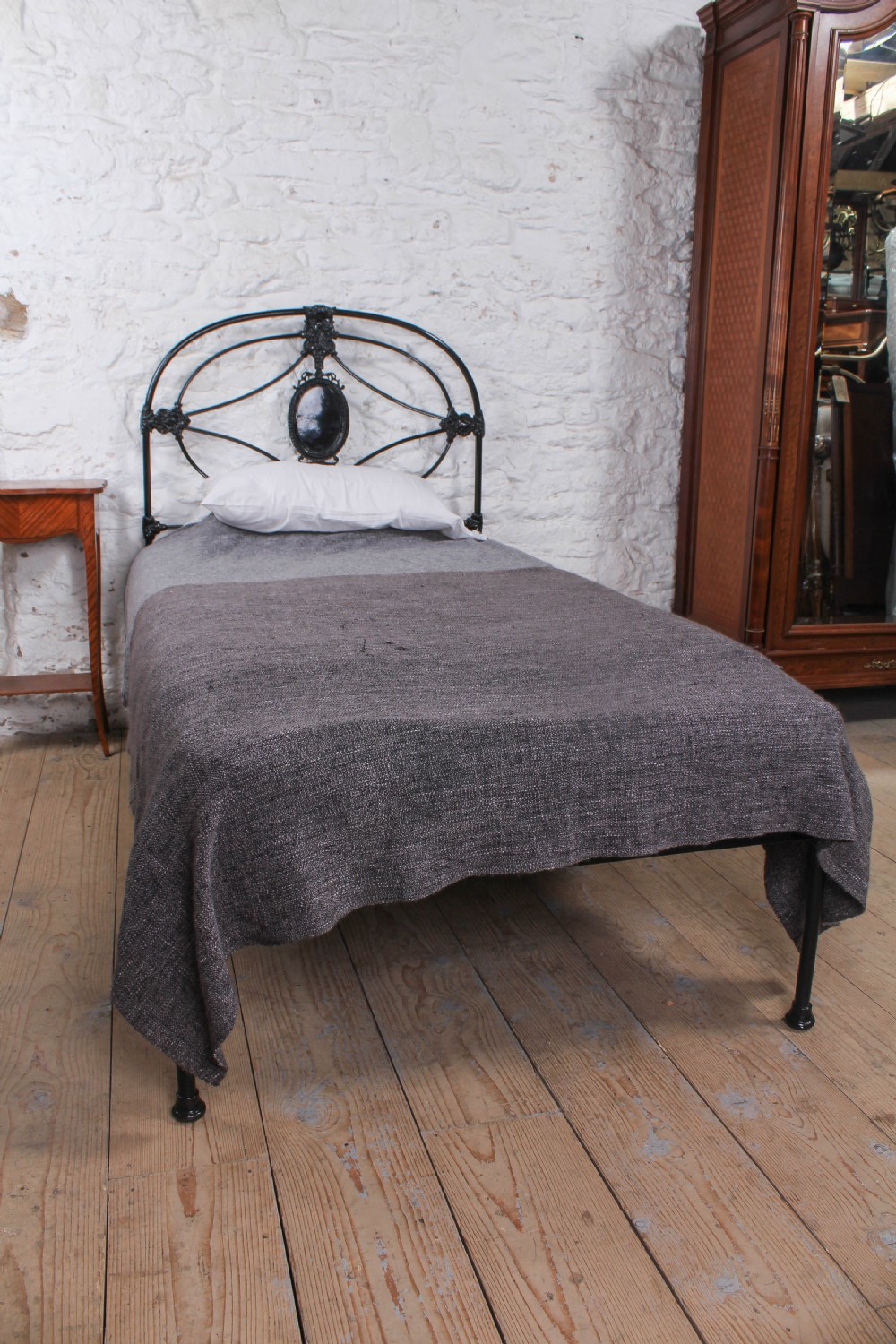 Handsome early Victorian black large single bed View III