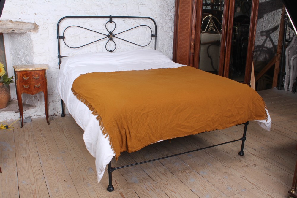 Lovely Irish Kingsize Bed with Central Brass Detail. 