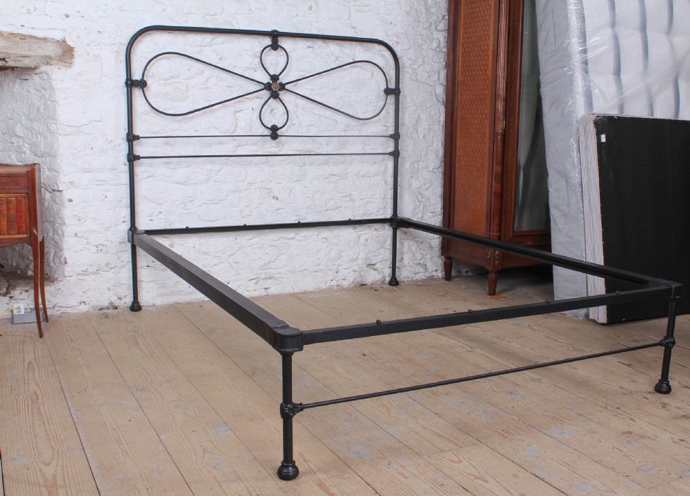 Lovely Irish Kingsize Bed with Central Brass Detail.  View VI