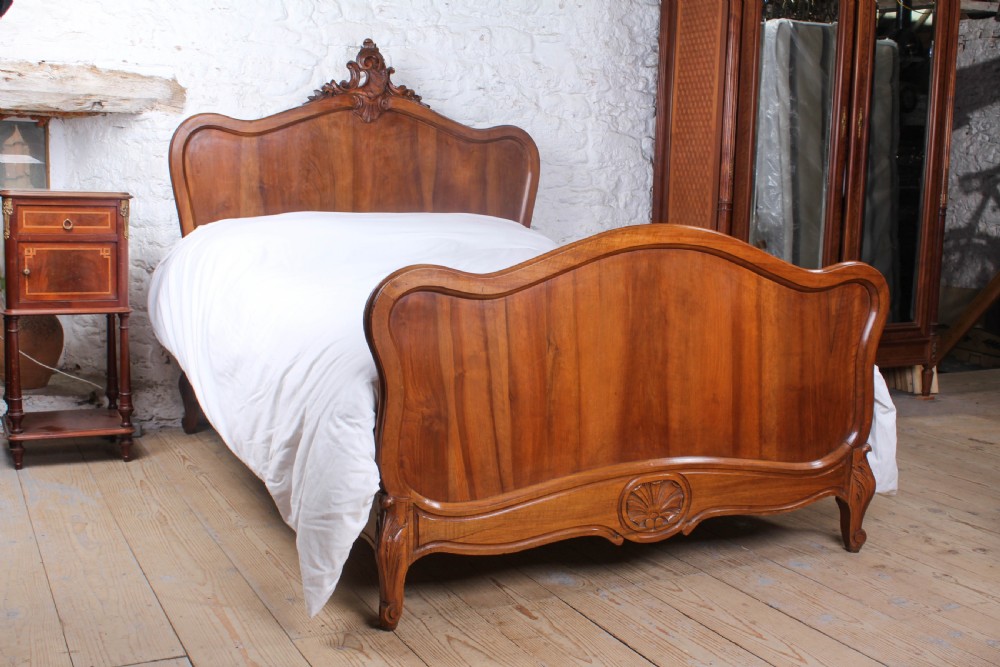 Exquisite Louis XV style sild walnut double bed