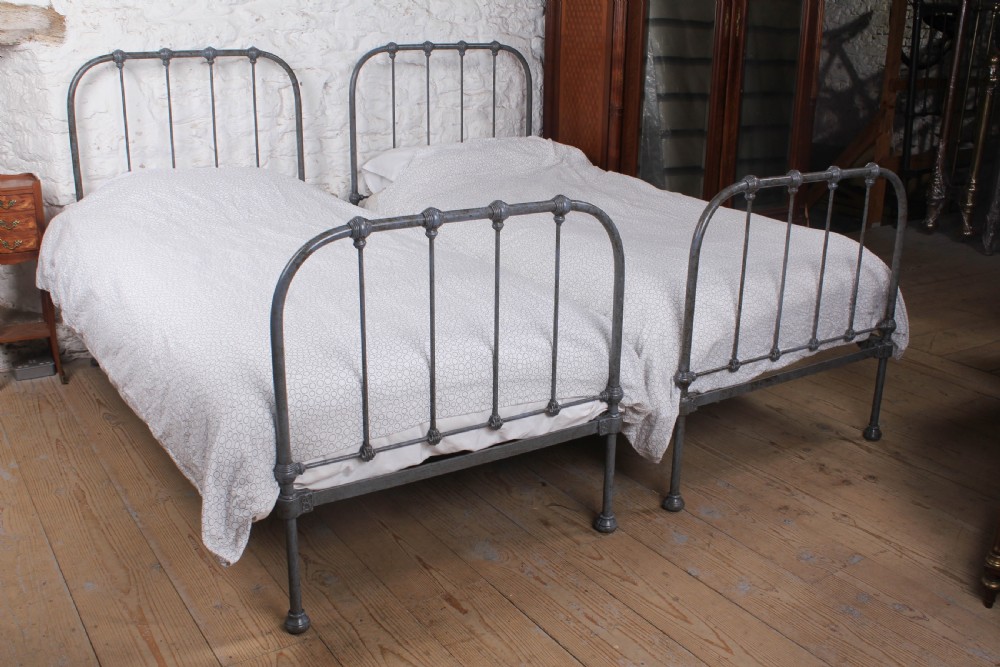 Timeless Pair of Detailed Utilitarian Single Beds