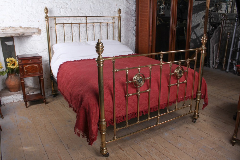 Handsome good quality all brass Heals king size bed 