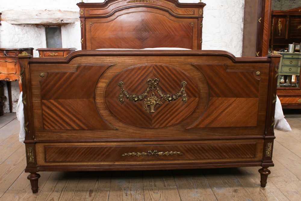 Handsome Louis XVI walnut bedroom suite with king size bed View IV
