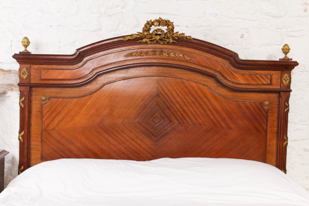 Handsome Louis XVI walnut bedroom suite with king size bed View V