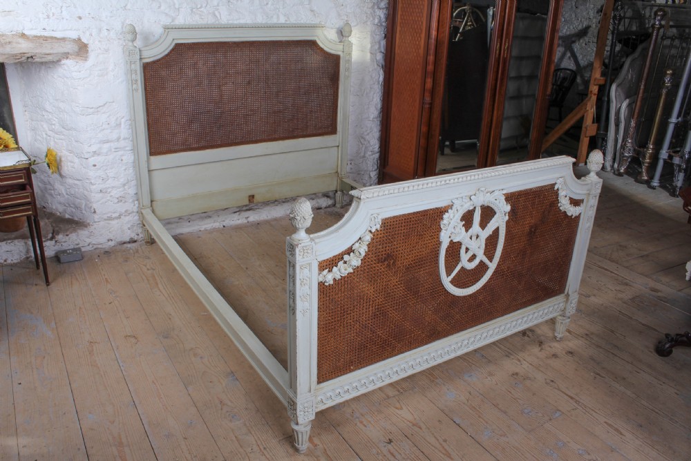 Fabulous French carved and caned king size bed View IX
